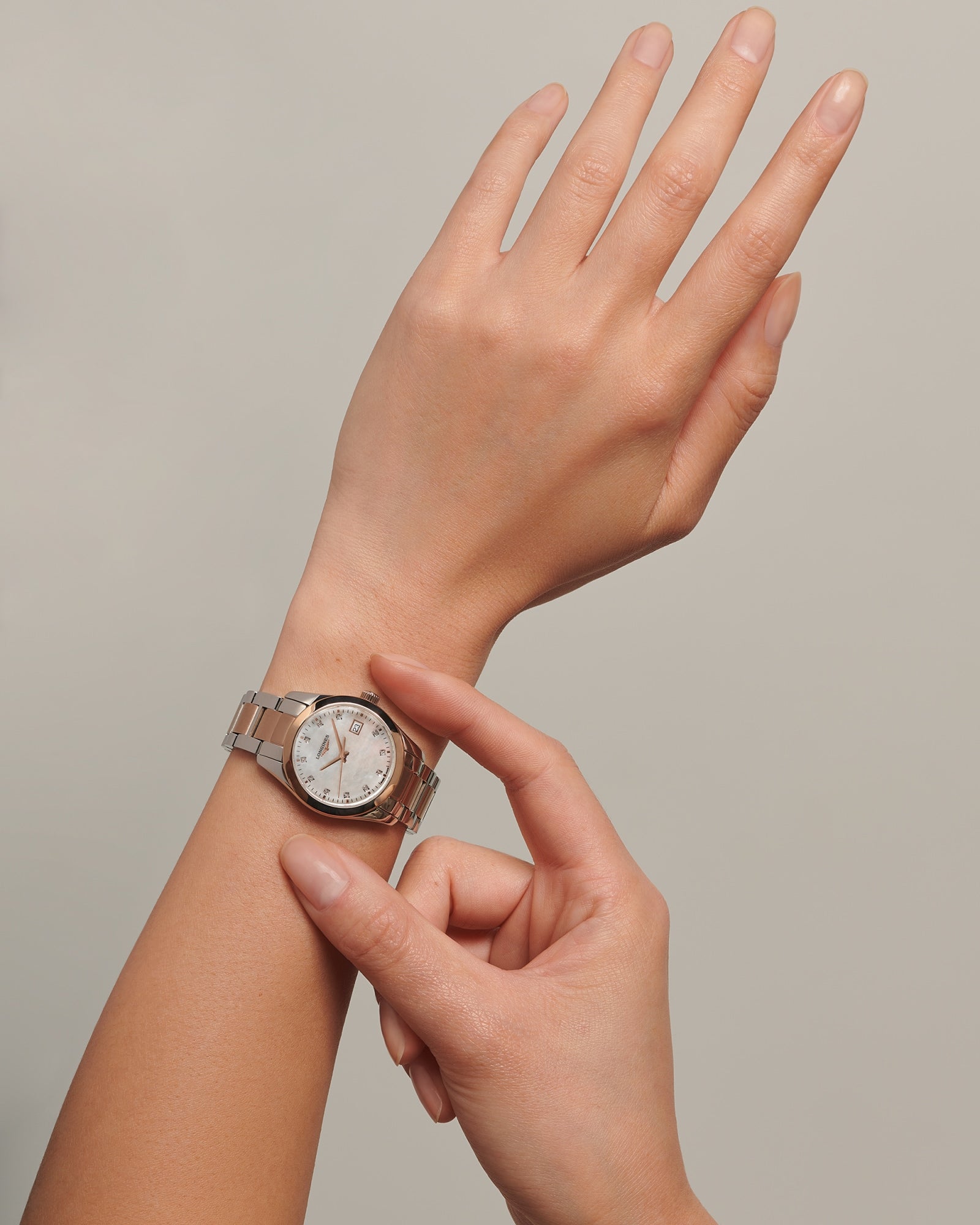 Longines Ladies Conquest Classic Quartz Watch 29.5mm Steel & Rose Gold PVD with Diamond Hour Markers